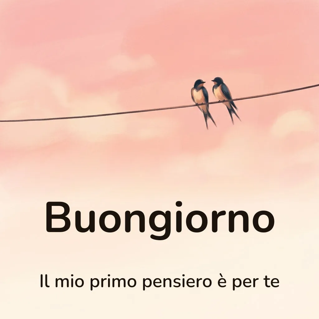 Immagine di buongiorno d’amore: due rondini vicine su un filo nel cielo rosato del mattino, con la scritta «Buongiorno» e «Il mio primo pensiero è per te»